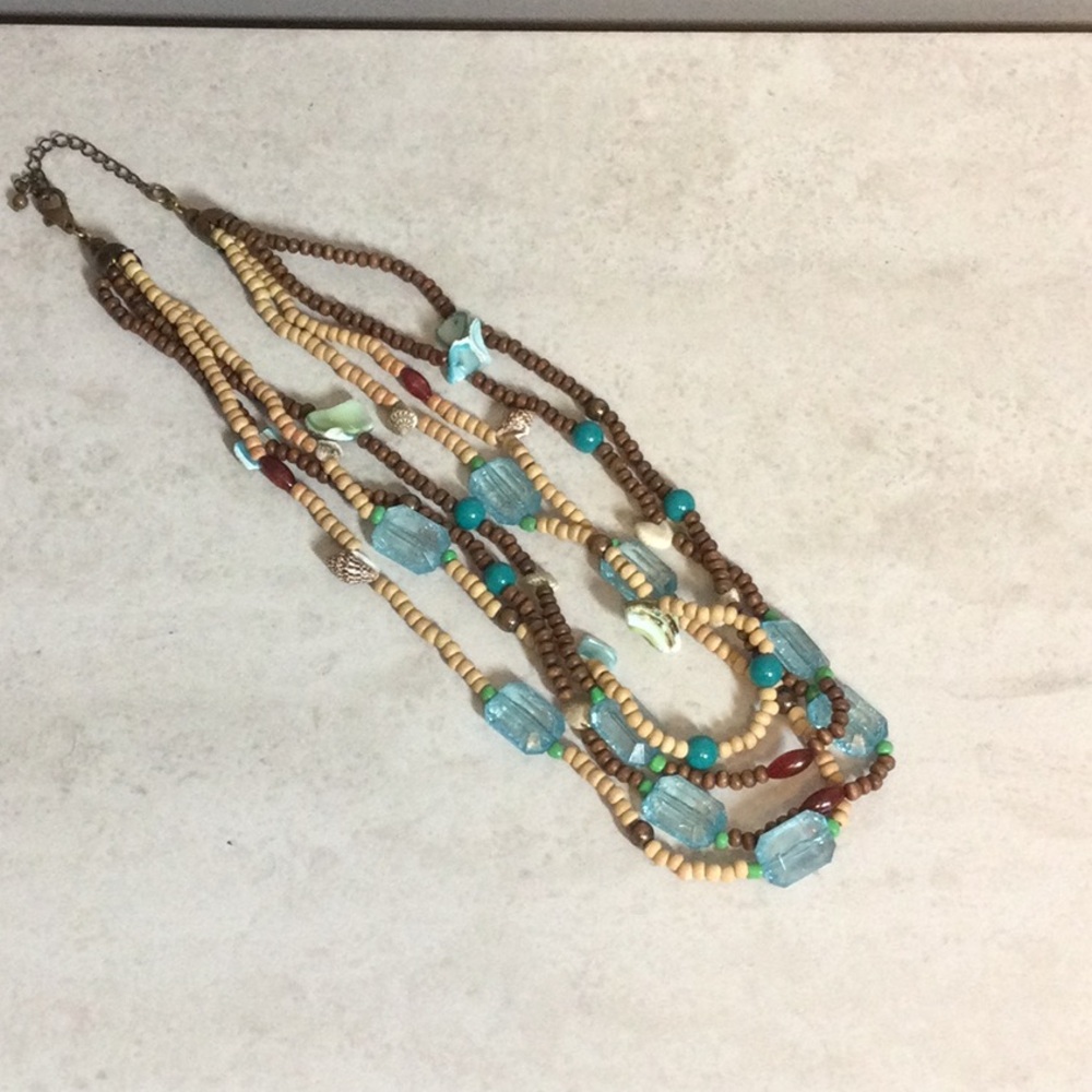 Four strand brown and tan with turquoise bead necklace